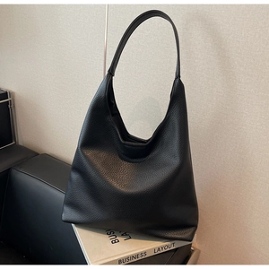 Chic black PU leather hobo shoulder bag with litchi texture and wide strap for daily use