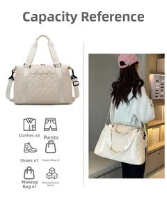 Detail of cream quilted travel bag showing large capacity storage and shoulder strap