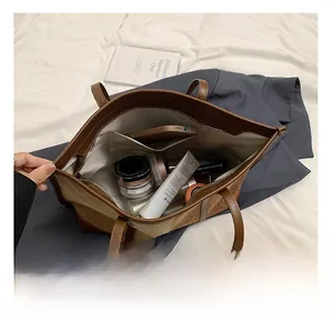 Top view of the spacious tote bag interior showing multi-pocket storage and lining
