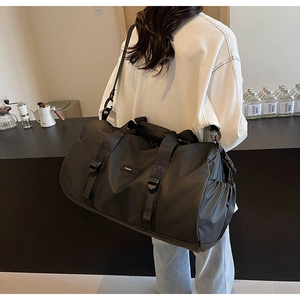 Detailed view of water-resistant oxford fabric texture on large capacity travel tote bag