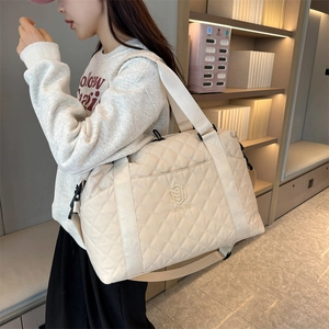 Quilted beige oxford fabric travel bag with large capacity and crossbody strap for women