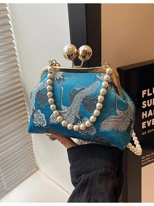 Elegant Chinese style blue brocade clutch bag with crane embroidery and pearl strap