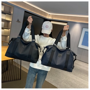Black and navy high-capacity waterproof oxford travel bags shown with handheld model view