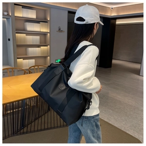 Black large capacity waterproof oxford travel bag with side logo and shoulder strap