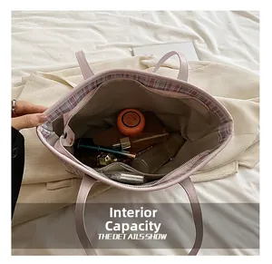 Internal capacity of the pink tote bag with pockets and soft checkered lining