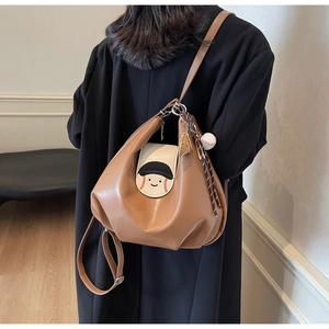 Brown PU leather backpack with a baseball-themed smiley face design and adjustable straps