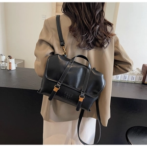 Detail of vintage black leather backpack with FREE 1981 COLOR embossed lettering