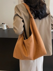 Large Maillard retro brown suede tote bag for women showing stylish slouchy shoulder wear