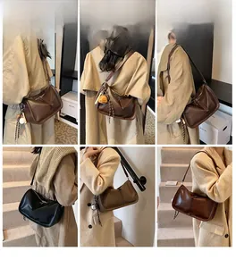 Boston style shoulder bag in three colors shown on a model in neutral indoor setting