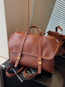 Zaino vintage marrone con fibbie e logo FREE 1981 COLOR in rilievo per donna