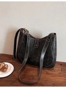 Retro black-grey leather shoulder bag with white stitching and large capacity design