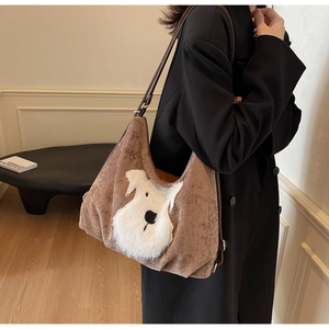 Detailed view of brown plush tote bag featuring a cute 3D puppy embroidery design
