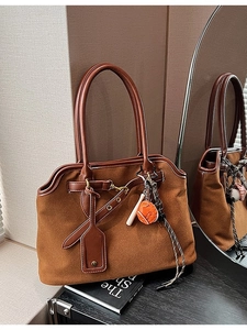 Vintage brown frosted faux suede tote bag with leather straps and baseball charm