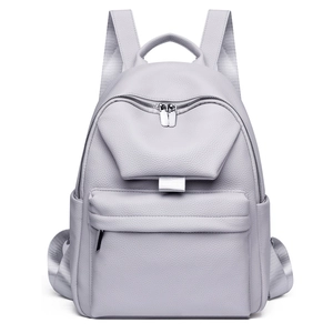 Close-up of litchi textured lavender leather backpack with silver metal zippers