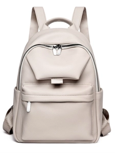 Minimalist beige textured leather backpack for women with front zipper pocket and top handle