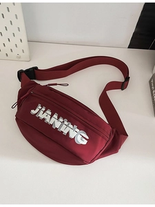 Burgundy nylon crossbody waist bag with white JIANING logo and adjustable strap