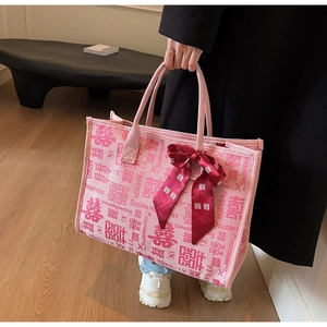 Pink bridal tote bag with Double Happiness print and elegant red satin bow charm
