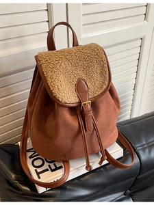 Brown suede and faux shearling backpack for women with vintage drawstring and metal buckles