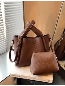 Large dark brown pebble leather bucket bag set with adjustable strap for women