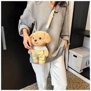 Detail of cute plush poodle crossbody bag with lace collar and adjustable strap