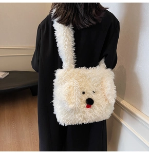 Back view of a model wearing the cute white plush puppy tote bag with fluffy straps