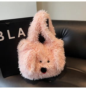 Close-up of a pink plush puppy tote bag showing soft furry texture and cute facial details