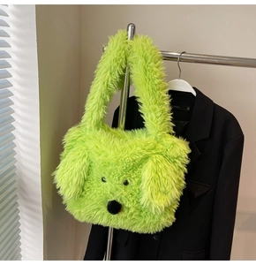 Detail of neon green plush tote bag featuring a cute furry puppy animal design