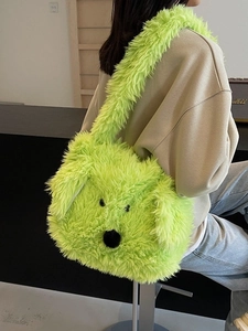 Fluorescent green plush dog-shaped tote bag with soft faux fur texture and long strap