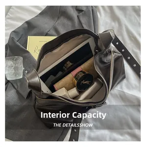 Macro view of spacious dark brown PU leather tote bag showing large internal capacity