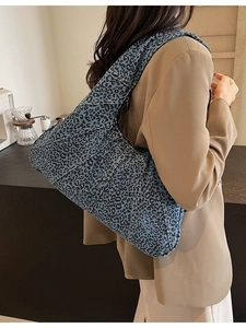Blue leopard print tote bag in vintage style with patchwork design and crossbody strap