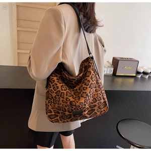 Close-up of leopard print hobo shoulder bag showing fabric texture and large capacity