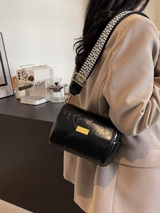 Retro black leather crossbody pillow bag with vintage wide geometric woven strap