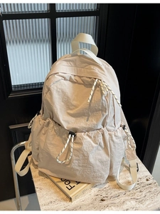Grand sac à dos de voyage en nylon beige pour femme avec détails de cordon tissé