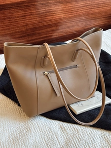 Minimalist large capacity faux leather tote bag with front zipper pocket in neutral brown