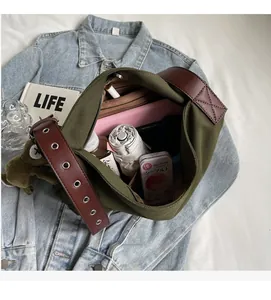 Spacious interior of olive green canvas tote bag showing high storage capacity