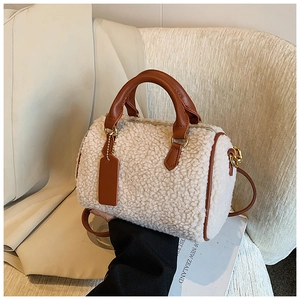 Plush lamb wool Boston bag with brown leather trim and adjustable shoulder strap