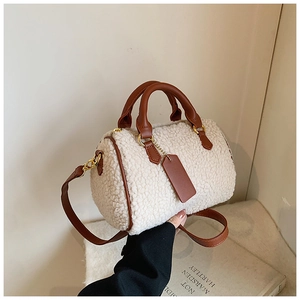 Chic beige plush faux fur Boston bag with brown PU leather trim and shoulder strap