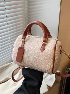 Fuzzy cream sherpa Boston bag with brown leather handles and adjustable shoulder strap