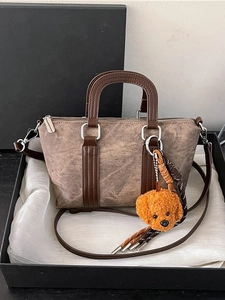Retro coffee brown pillow handbag with leather handles and teddy dog pendant