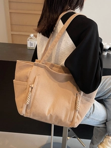 Schicke beige Cord-Einkaufstasche mit Seitentaschen und geflochtenem Reißverschluss