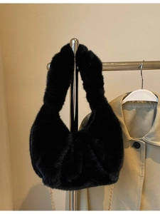 Furry black plush chain shoulder bag with soft faux fur texture and gold metal chain strap