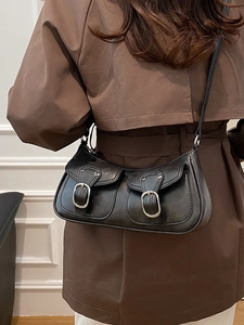 Retro black leather underarm bag with double front pockets and silver buckle detail