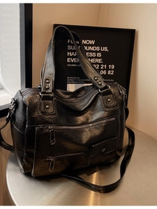 Sac de voyage vintage en cuir PU noir à grande capacité avec plusieurs poches et bandoulière