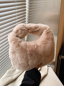 Chic light beige plush dumpling handbag with soft faux fur texture for women winter fashion