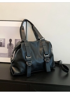 Minimalist black large-capacity tote bag in textured faux leather with silver D-rings