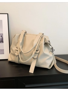 Cream white large capacity tote bag with silver ring hardware and shoulder strap