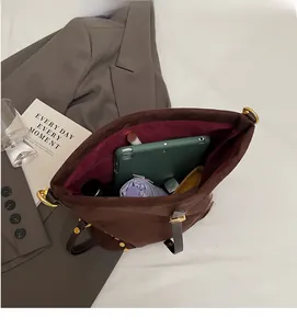 Spacious interior of dark brown PU tote bag showing large capacity for tablet and items
