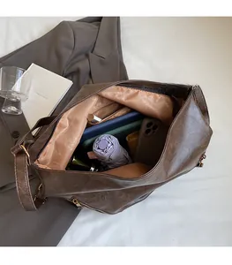 Interior view of large brown vintage tote bag showing ample space for iPad and essentials