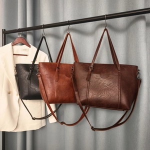 Detailed comparison of retro tote bags in black, caramel, and coffee brown faux leather