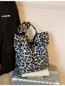 Large leopard print tote bag with gold metal logo plaque for autumn fashion